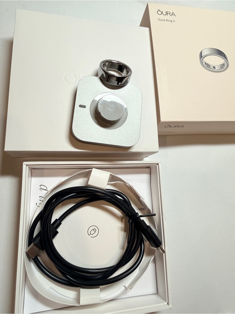 Silver Oura Ring 4, size 10 with original box and Replacement charging cable